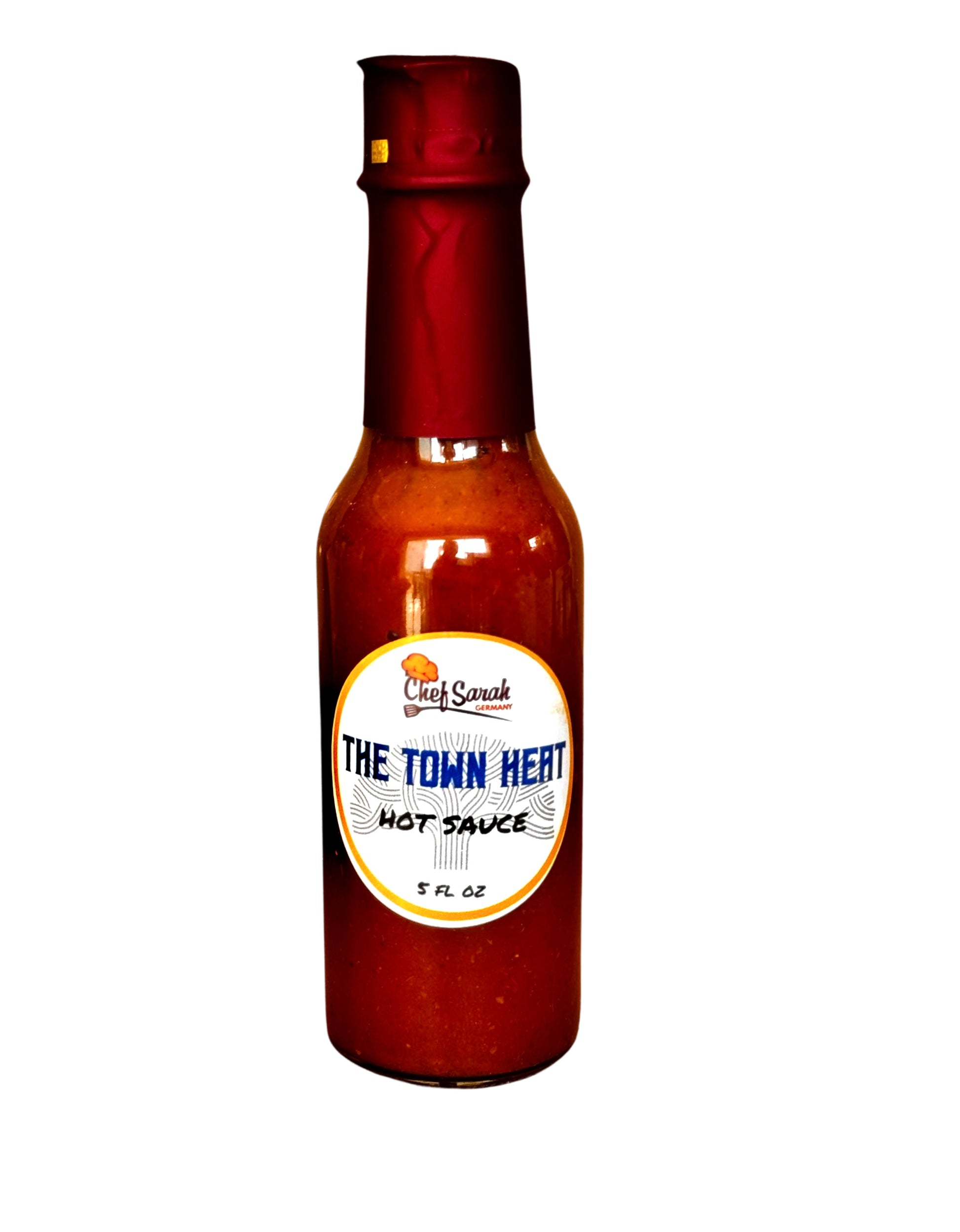 Bottle of 'The Town Heat' hot sauce on a white background